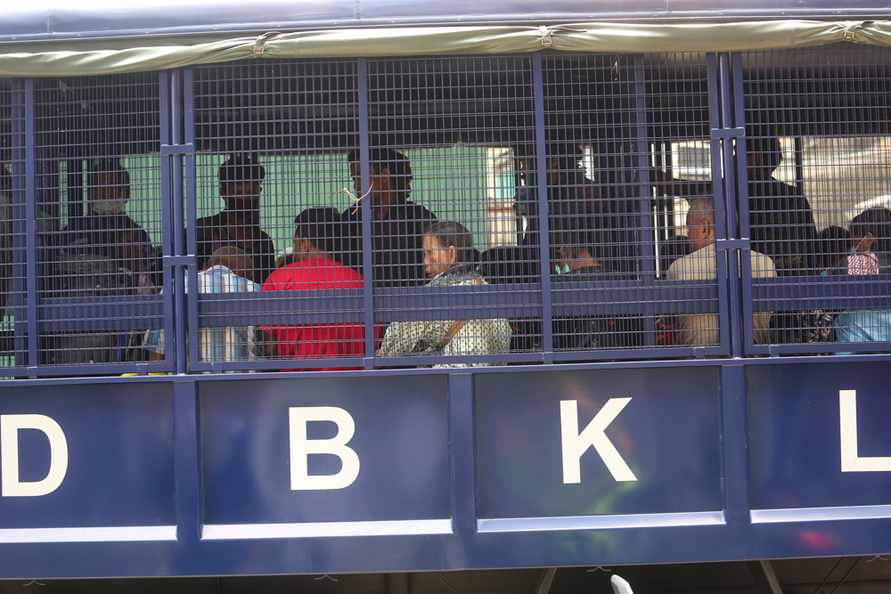 DBKL, police and Welfare Dept enforcement officers round up homeless people in Kuala Lumpur to convey them to shelters March 30, 2020. u00e2u20acu201d Picture by Choo Choy May.