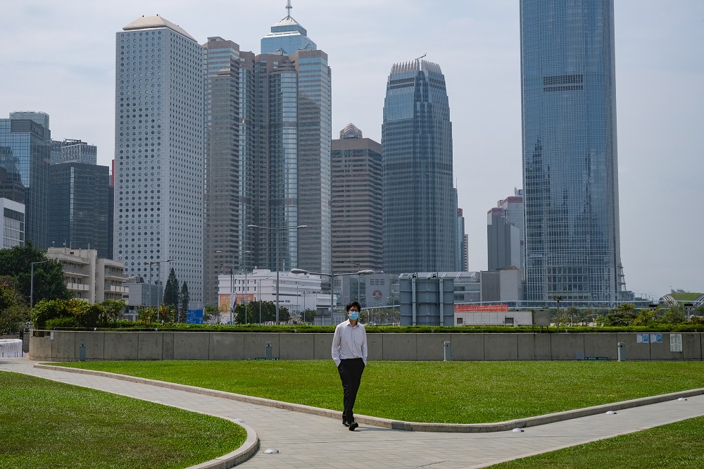 A man with a protective face mask takes his lunch breaks at the financial Central district, following the coronavirus disease outbreak in Hong Kong March 27, 2020. u00e2u20acu201d Reuters pic