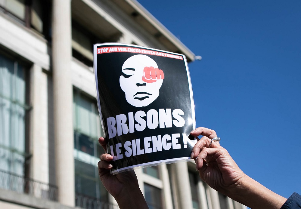 A person holds a sign reading ‘Break the silence’ during a rally to denounce femicides and domestic violence in Le Havre, northwestern France September 18, 2019. — AFP pic