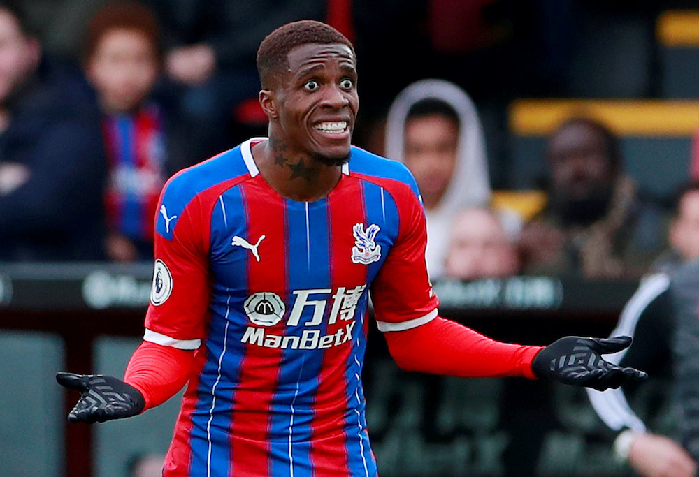 Crystal Palaceu00e2u20acu2122s Wilfried Zaha reacts during a match against Watford, March 7, 2020. u00e2u20acu201d Action Images via Reuters/Andrew Couldridge 