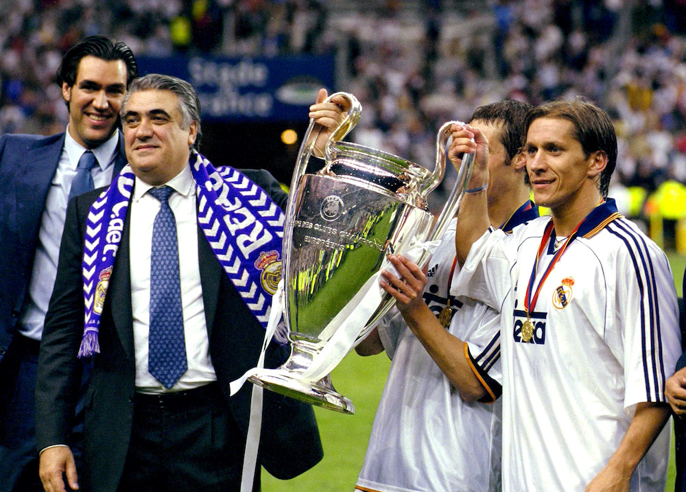 File picture of Lorenzo Sanz the former Real Madrid President holding the Uefa Champions League trophy with Michel Salgado Mandatory, May 24, 2000. u00e2u20acu201d Action Images/John Sibley pic via Reuters