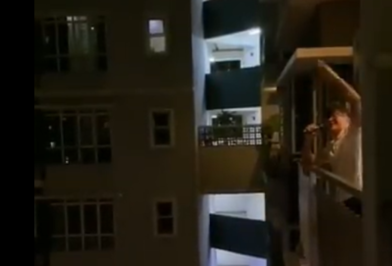 Malaysians sing out from their balconies during the nationwide Covid-19 shutdown. u00e2u20acu201d Screengrab via Facebook/Shaunajoann
