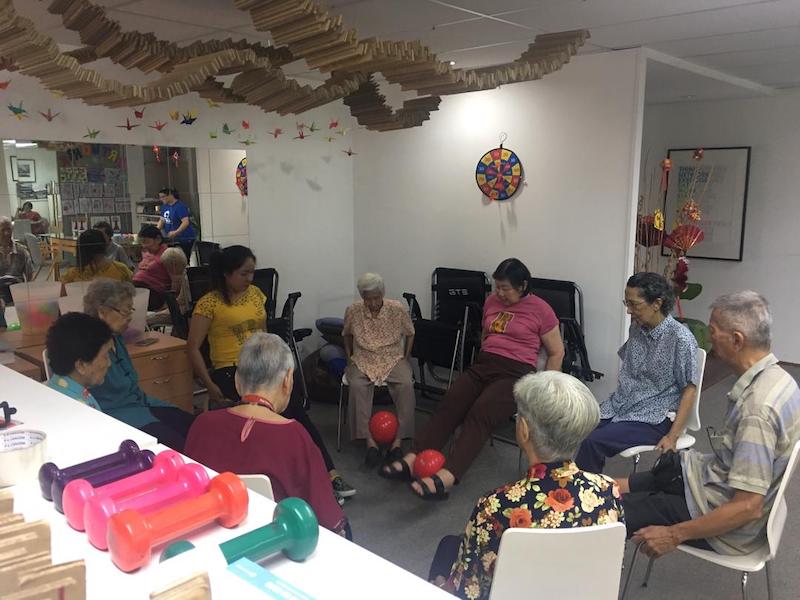 A photo of CARE Conciergeu00e2u20acu2122s dayCARE attendees performing a simple exercise routine prior to the movement control order. u00e2u20acu201d Picture courtesy of CARE Concierge