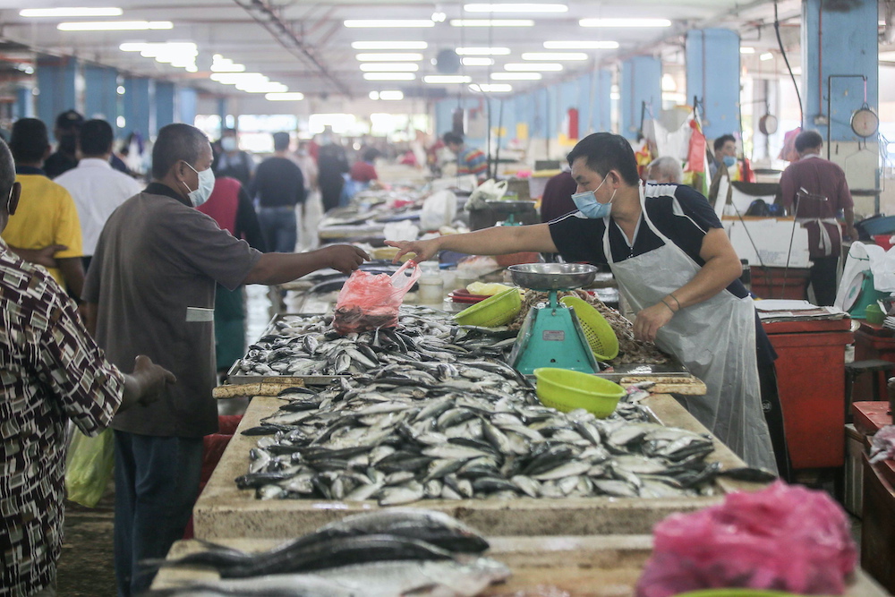 Traders say supply of fresh food such as seafood is adequate at the Ipoh Central Market despite the movement control order. —  Picture by Farhan Najib 