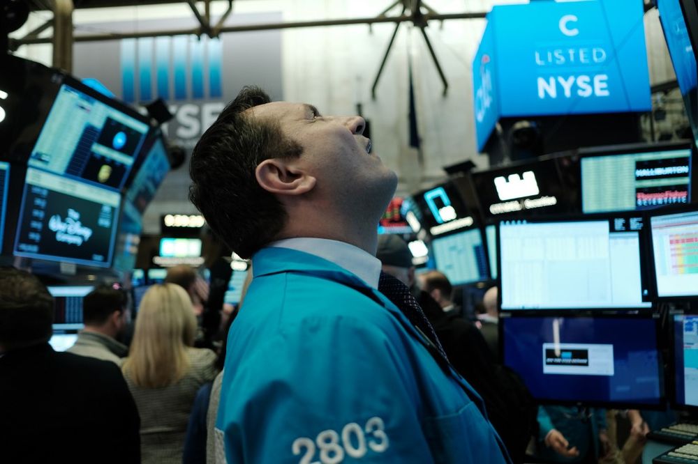 Traders work on the floor of the New York Stock Exchange (NYSE) on March 09, 2020 in New York City. Trading was halted for 15 minutes after the opening bell as stocks fell 7 per cent. u00e2u20acu201d AFP pic