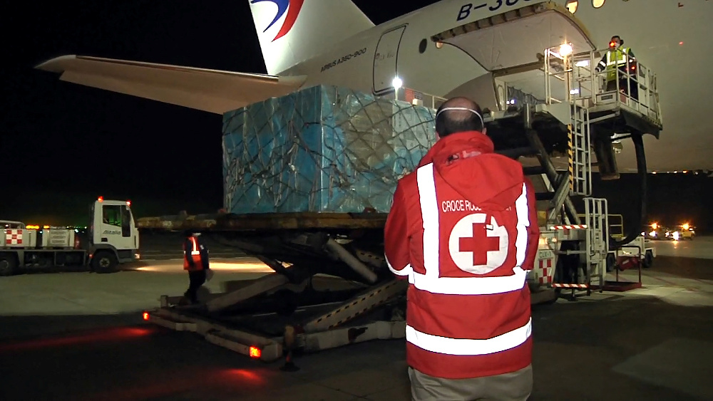 A box of a consignment of medical supplies is taken out of a Chinese chartered plane after arriving at Romeu00e2u20acu2122s Fiumicino airport, to help Italy cope with a coronavirus outbreak, in Rome, Italy, March 12, 2020. u00e2u20acu201d Aeroporti di Roma handout pic via Reuter