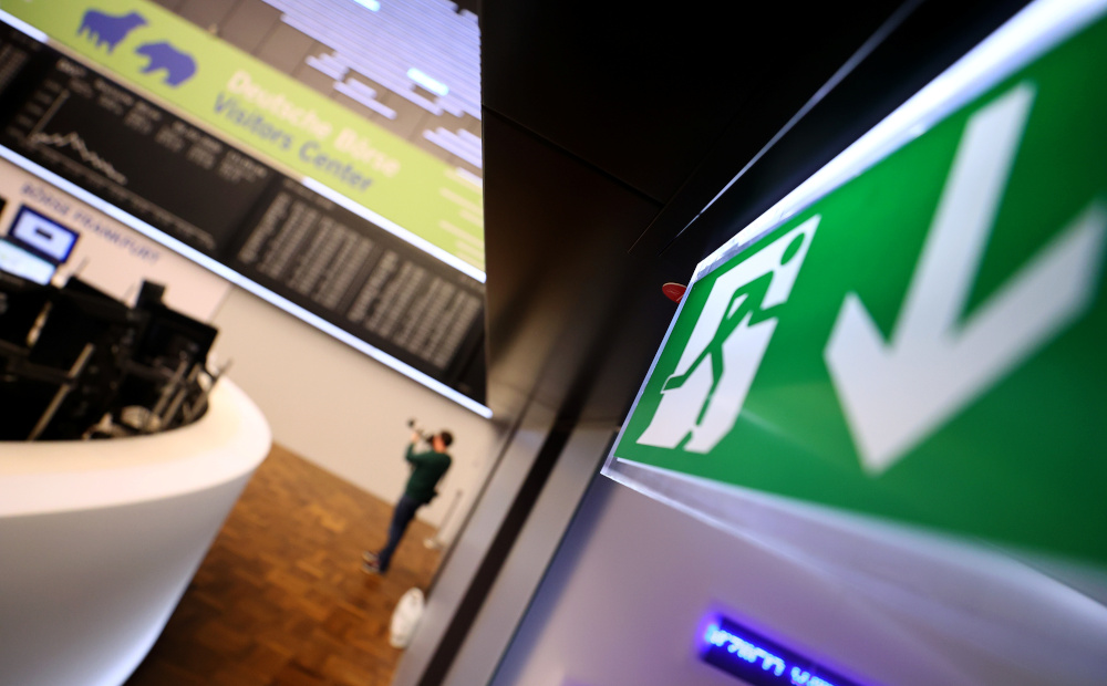A photographer takes pictures of the German share price index (DAX) board at the stock exchange in Frankfurt, Germany, February March 9, 2020. u00e2u20acu201d Reuters pic 
