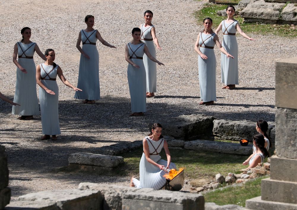 Greek actress Xanthi Georgiou, playing the role of High Priestess lights the flame during the dress rehearsal for the Olympic flame lighting ceremony for the Tokyo 2020 Summer Olympics, at Olympia, Greece - March 11, 2020. u00e2u20acu201d Reuters pic