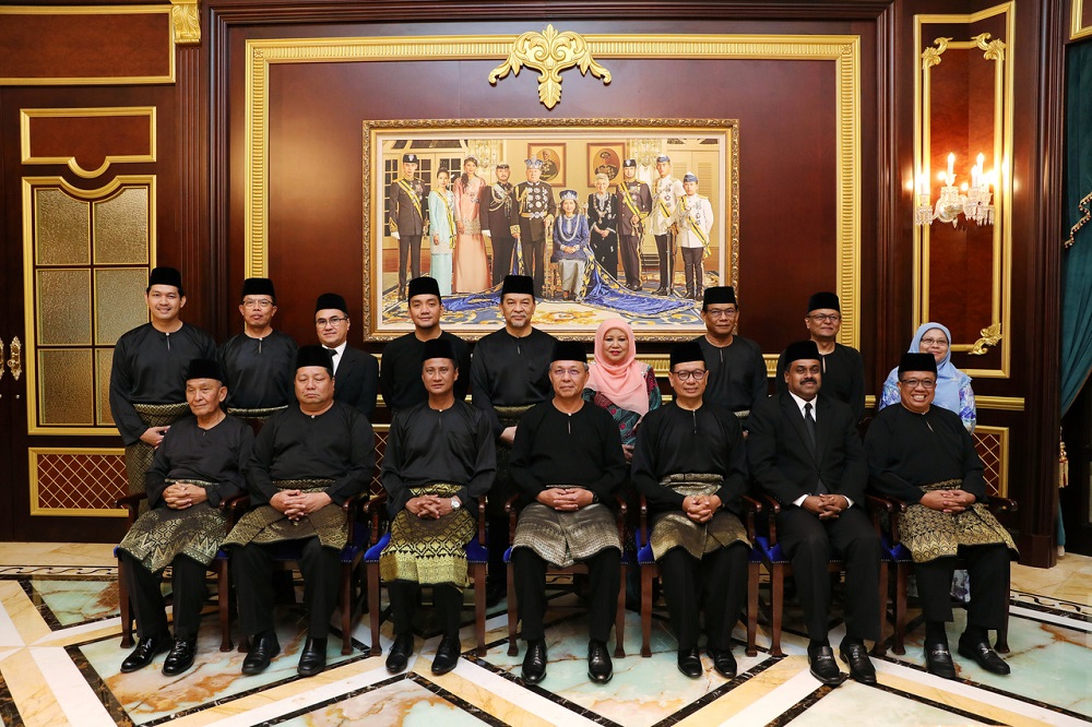 Johor Mentri Besar Datuk Hasni Mohammad (front row, centre) pose for a photo with the new Johor State Executive Council members in Johor Baru March 6, 2020. u00e2u20acu201d Bernama pic