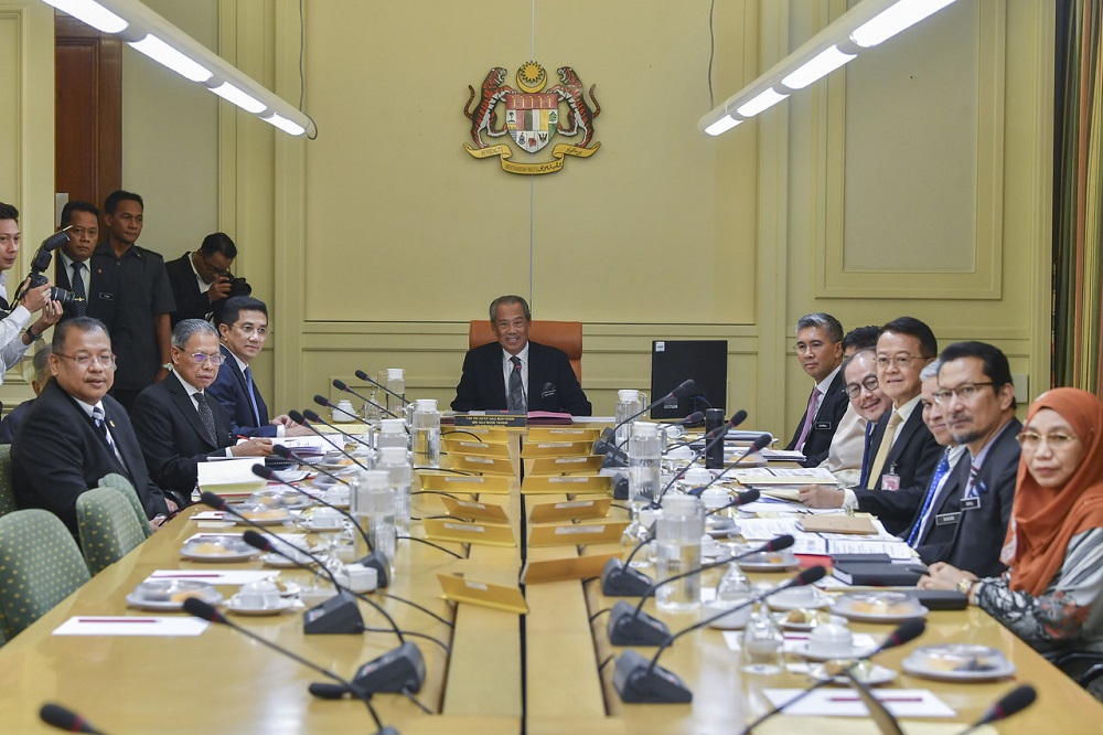 Prime Minister Tan Sri Muhyiddin Yassin (centre) chairs the Economic Action Council meeting at Putrajaya March 16, 2020. u00e2u20acu201d Bernama pic