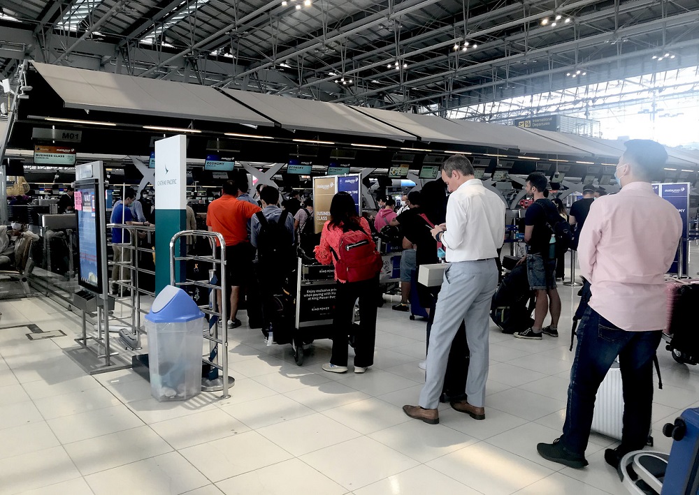 People wait in queues at the Suvarnabhumi Airport in Bangkok March 17, 2020. u00e2u20acu201d Bernama pic