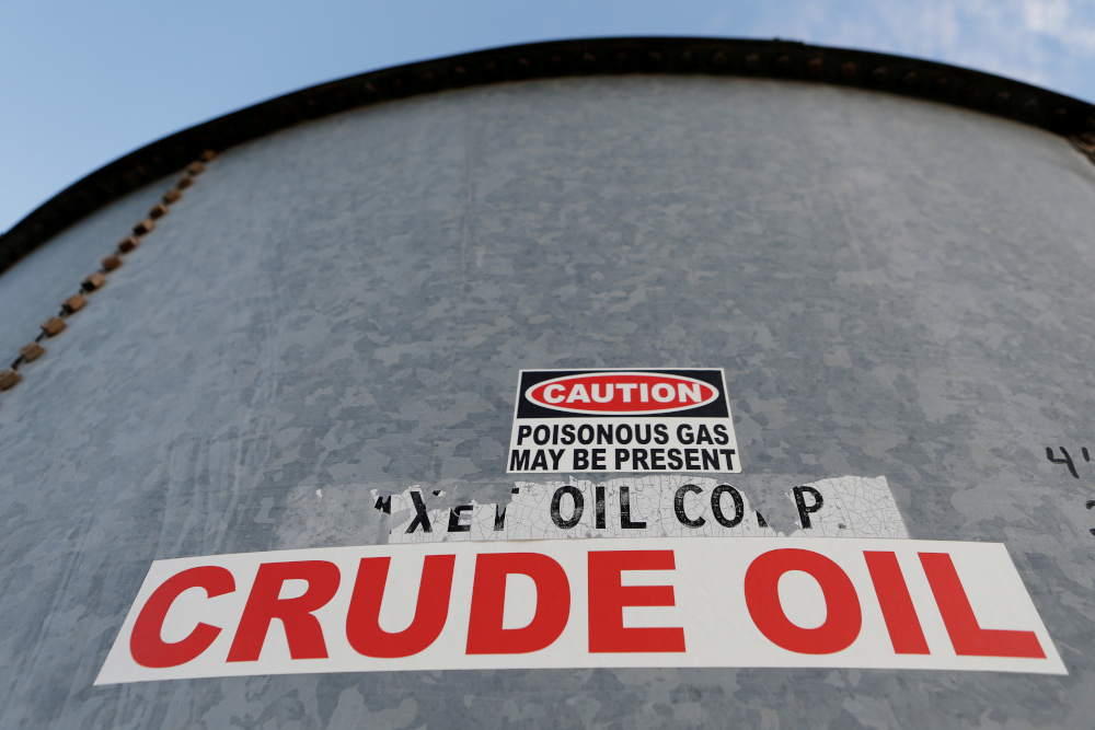 A sticker reads crude oil on the side of a storage tank in the Permian Basin in Mentone, Loving County, Texas, US November 22, 2019. u00e2u20acu201d Reuters pic 