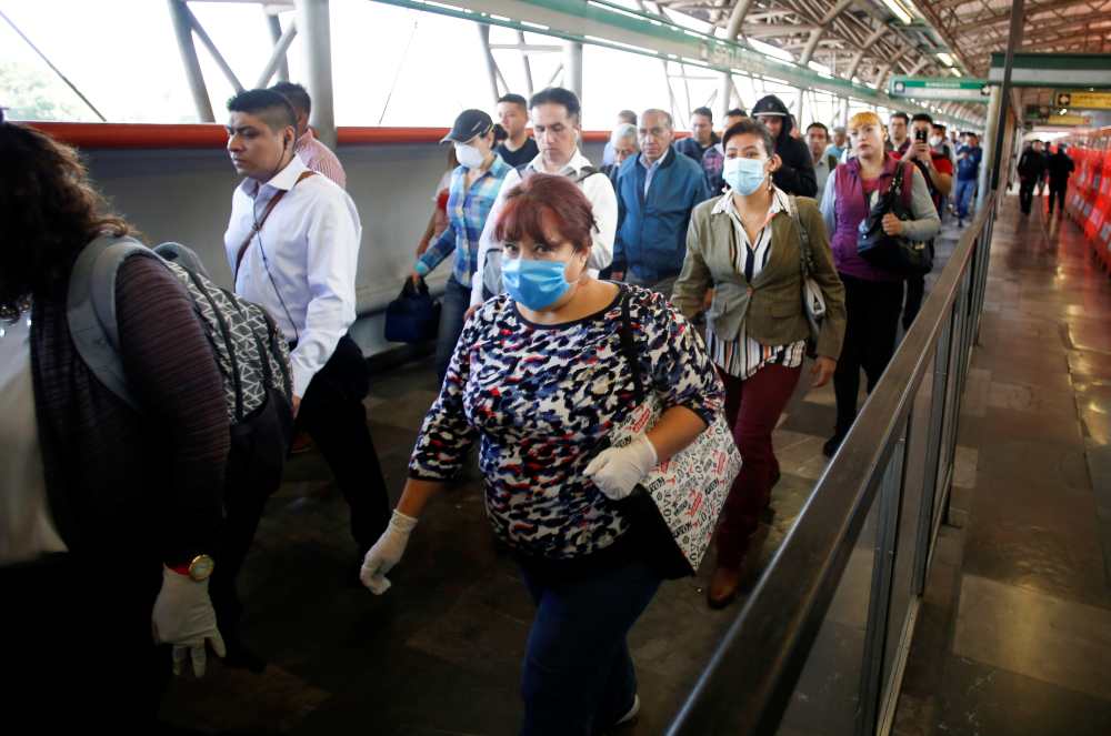 A commuter wearing a protective face mask walks inside metro installations as the outbreak of coronavirus disease continues, in Mexico City March 24, 2020. u00e2u20acu2022 Reuters pic
