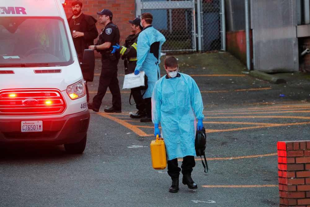 Firefighters wearing personal protective equipment (PPE) walk away after responding to a medical call amid the coronavirus disease outbreak in Seattle, Washington March 24, 2020. u00e2u20acu2022 Reuters pic 