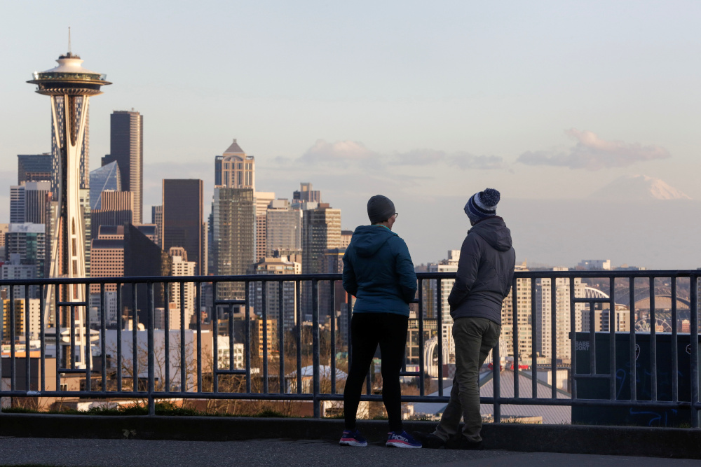 People look out at the iconic Space Needle, as greater Seattle battles one of the biggest US cases of the coronavirus, in Seattle, Washington, US March 12, 2020. u00e2u20acu201d Reuters pic 