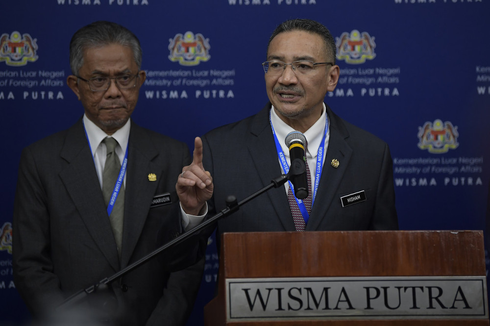 Foreign Minister Datuk Seri Hishammuddin Hussein and his deputy Datuk Kamaruddin Jaafar during a press conference at Wisma Putra March 11, 2020. u00e2u20acu201d Bernama pic 
