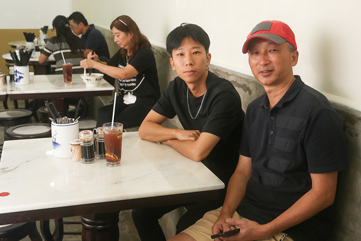 The eatery serves Hung Shu Cheong's (right) family recipe for beef noodles that he has also taught to his son Kwan Lai (left)