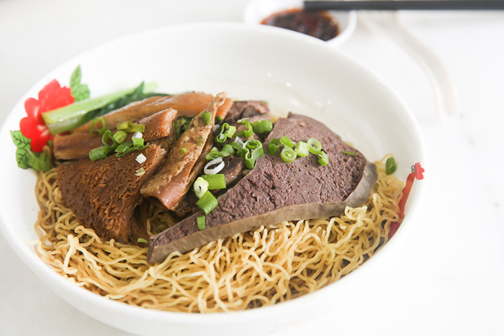 Go for the dry beef noodles served with thin egg noodles brought in from Hong Kong that absorb the sauce better
