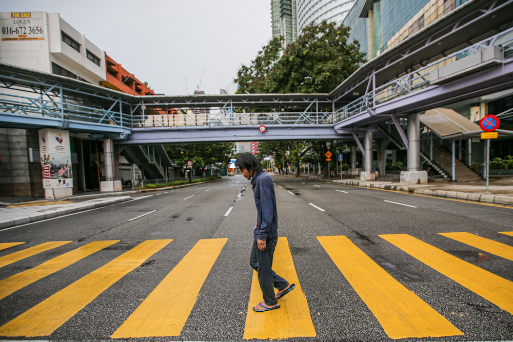 The homeless can still be seen everywhere around the Kuala Lumpur city centre March 21, 2020, on the fourth day of the movement control order enforced to control the spread of Covid-19. u00e2u20acu201d Picture by Hari Anggara