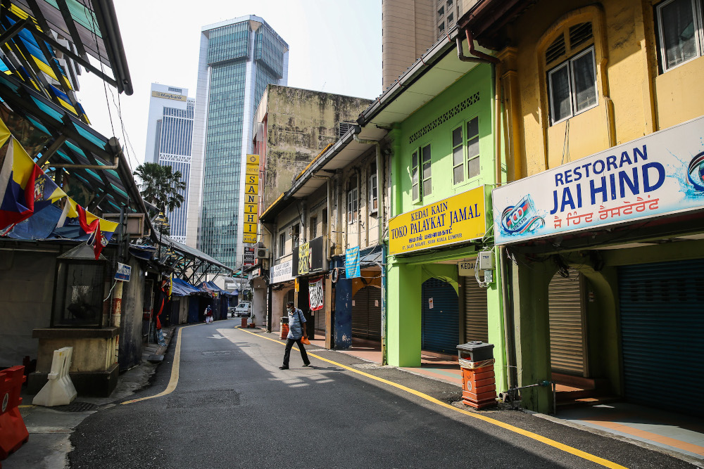 A man walks in front of a closed shop in Kuala Lumpur March 21, 2020. u00e2u20acu201d Picture by Yusof Mat Isa