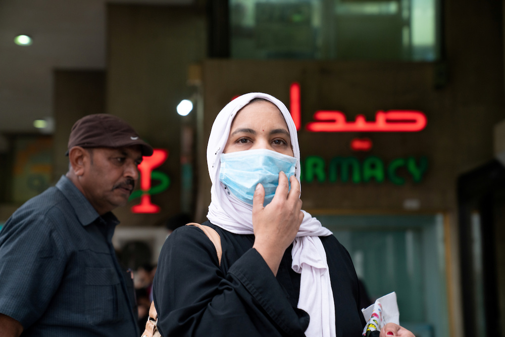 A woman wears a protective face mask, following the outbreak of the new coronavirus, in Kuwait, February 25, 2020. u00e2u20acu201d Reuters picnnn