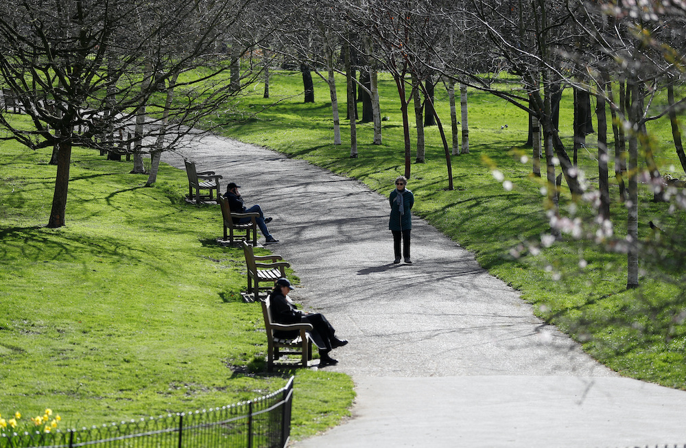 A woman takes a stroll in Hyde Park as the spread of the coronavirus disease (Covid-19) continues. London, Britain March 21, 2020. u00e2u20acu201d Reuters picnn