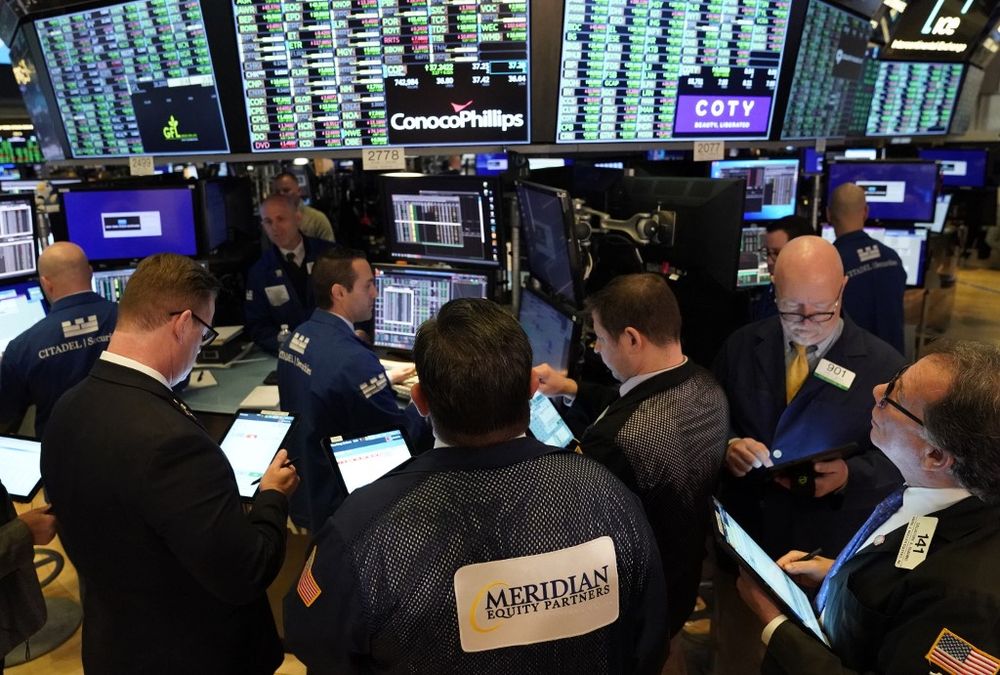 Traders work on the floor of the New York Stock Exchange during the opening bell, March 10, 2020 in New York. u00e2u20acu201d AFP pic