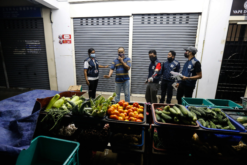 Shops around Georgetown were u00e2u20acu02dcambushedu00e2u20acu2122 by the Penang Island Municipal Council after operating beyond the designated time during an operation March 25, 2020. u00e2u20acu201d Picture by Sayuti Zainudin