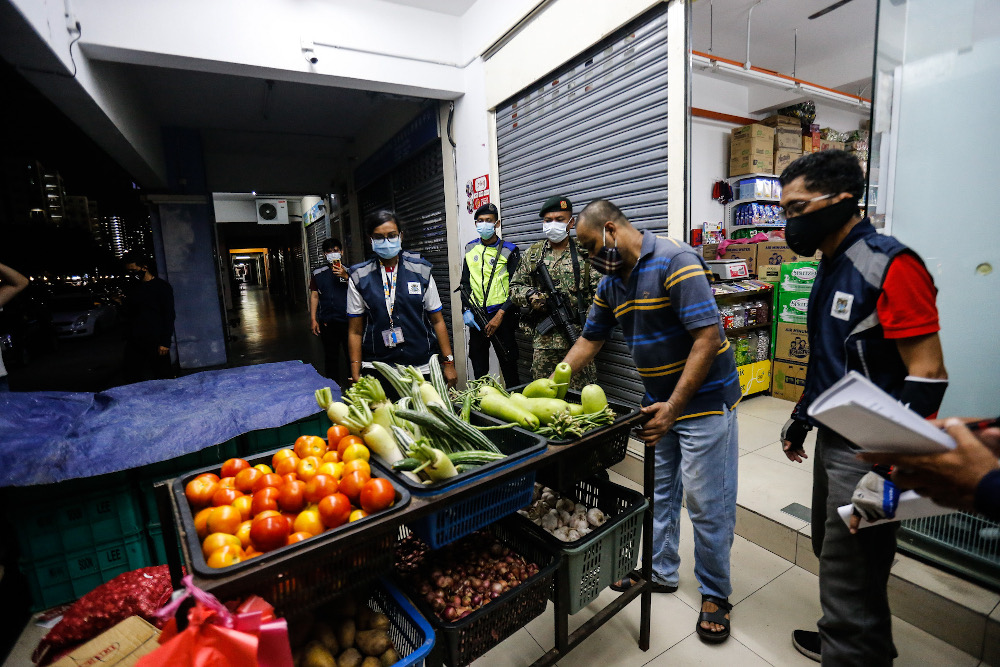 Shops around Georgetown were u00e2u20acu02dcambushedu00e2u20acu2122 by the Penang Island Municipal Council after operating beyond the designated time during an operation March 25, 2020. u00e2u20acu201d Picture by Sayuti Zainudin