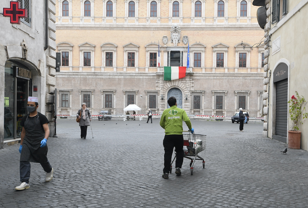 A supermarket employee delivers products as Italy tightens measures to try and contain the spread of coronavirus disease (Covid-19), in Rome, Italy March 28, 2020. u00e2u20acu201d Reuters pic