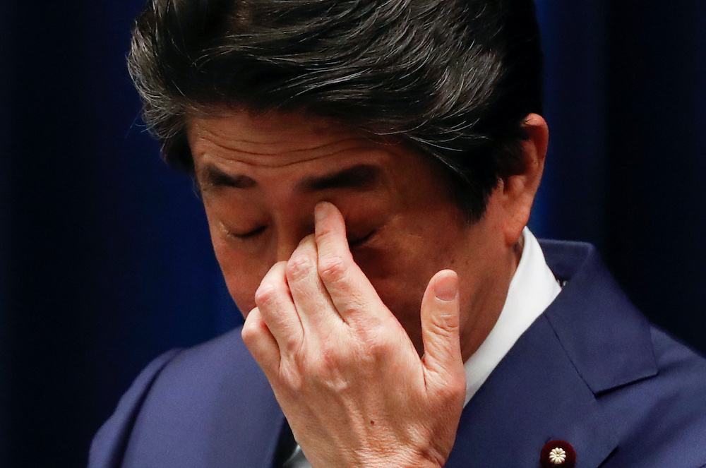 Japanu00e2u20acu2122s Prime Minister Shinzo Abe reacts during a news conference on Japan's response to the coronavirus outbreak at his official residence in Tokyo, Japan March 14, 2020. u00e2u20acu201d Reuters picnn