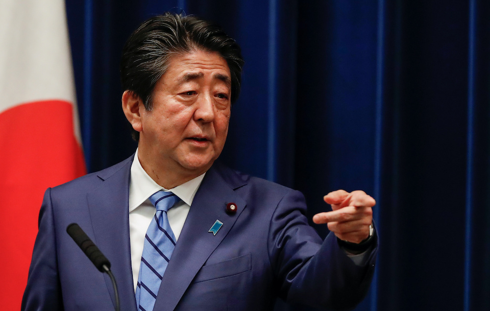 Japanu00e2u20acu2122s Prime Minister Shinzo Abe gestures as he speaks during a news conference on Japan's response to the coronavirus outbreak at his official residence in Tokyo, Japan March 14, 2020. u00e2u20acu201d Reuters picnnn