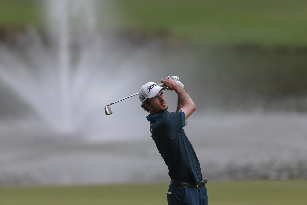 Trevor Simsby chipped brilliantly all week and showed his mettle by attacking the pin on the playoff holes to beat Australian Andrew Dodt for his biggest win on tour. — Picture by Ahmad Zamzahuri 