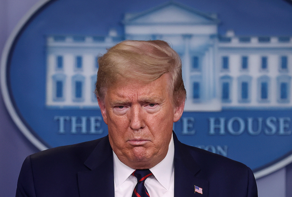 US President Donald Trump takes questions during the daily coronavirus response briefing at the White House in Washington, US, March 27, 2020. — Reuters pic
