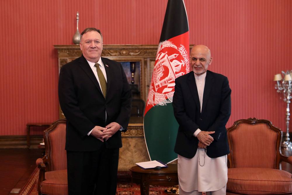 Afghanistan's President Ashraf Ghani (right) and US Secretary of State Mike Pompeo, pose for a photo during their meeting in Kabul March 23, 2020. u00e2u20acu2022 Handout via Reuters