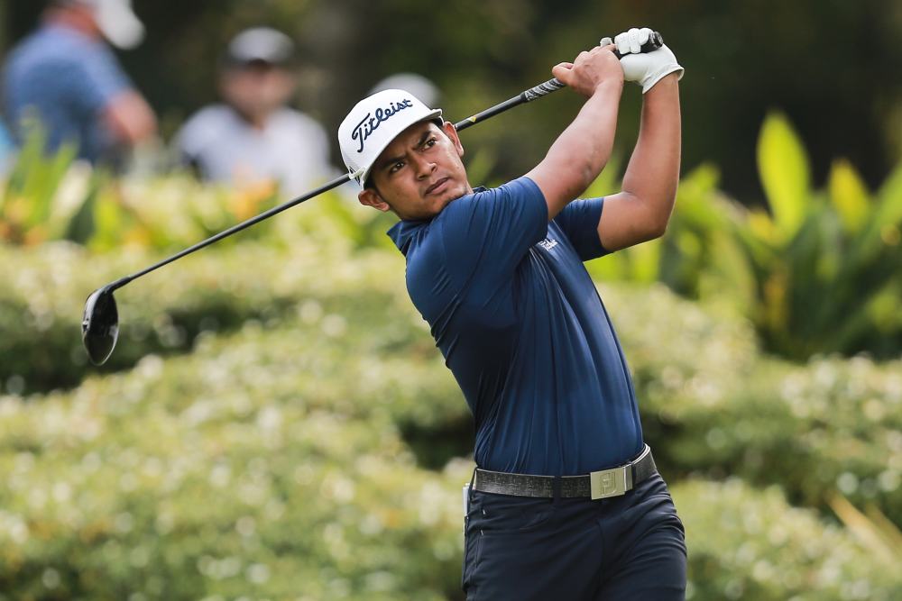Mohammad Wafiyuddin Abdul Manaf carded a credible 4-under par 68 while Fung came in at 3-under 69 to lead the 47 other Malaysians in the 156-field draw. u00e2u20acu2022 Picture by Ahmad Zamzahuri