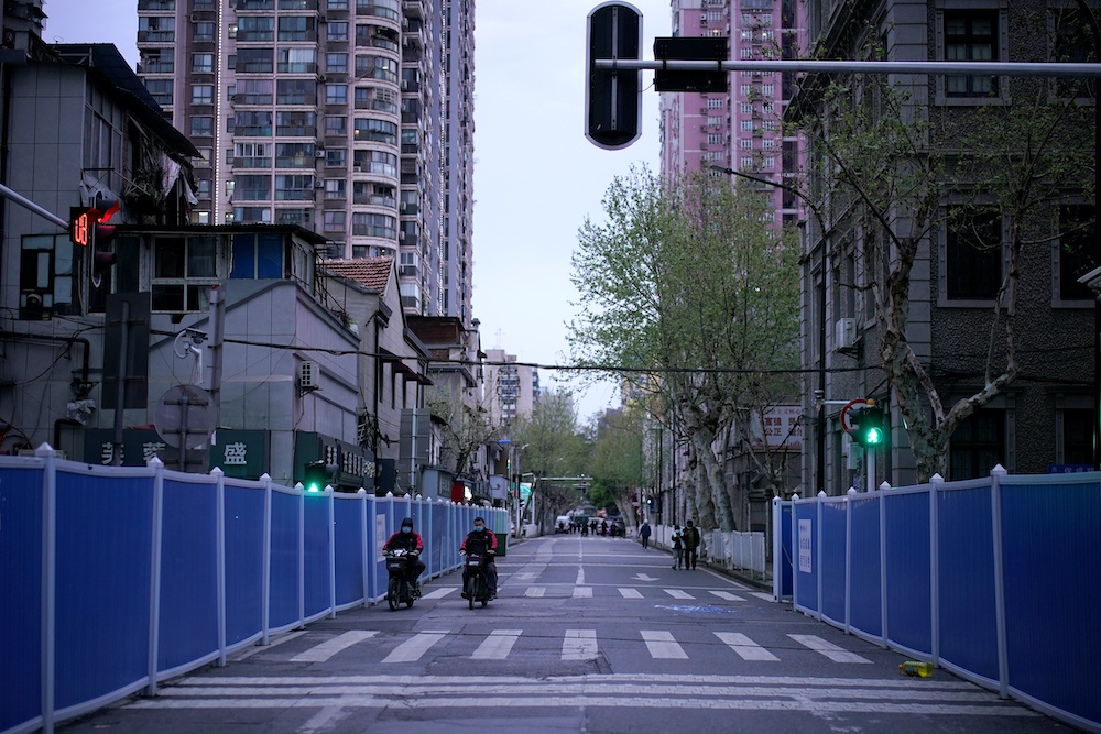 Barriers set up to separate residential buildings from a street are seen in Wuhan, Hubei province, the epicentre of China's coronavirus disease (Covid-19) outbreak, March 28, 2020. — Reuters pic