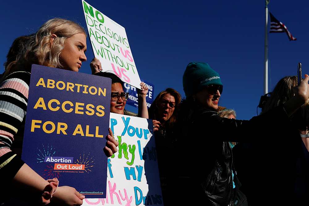 Pro-choice demonstrators hold up signs outside of the US Supreme Court in Washington, March 4, 2020. u00e2u20acu201d  Reuters pic