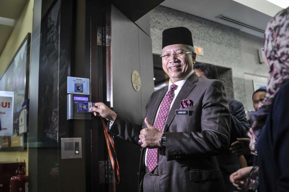 Tan Sri Annuar Musa clocks in on his first day as Federal Territories Minister in Putrajaya March 11, 2020. u00e2u20acu201d Picture by Shafwan Zaidon