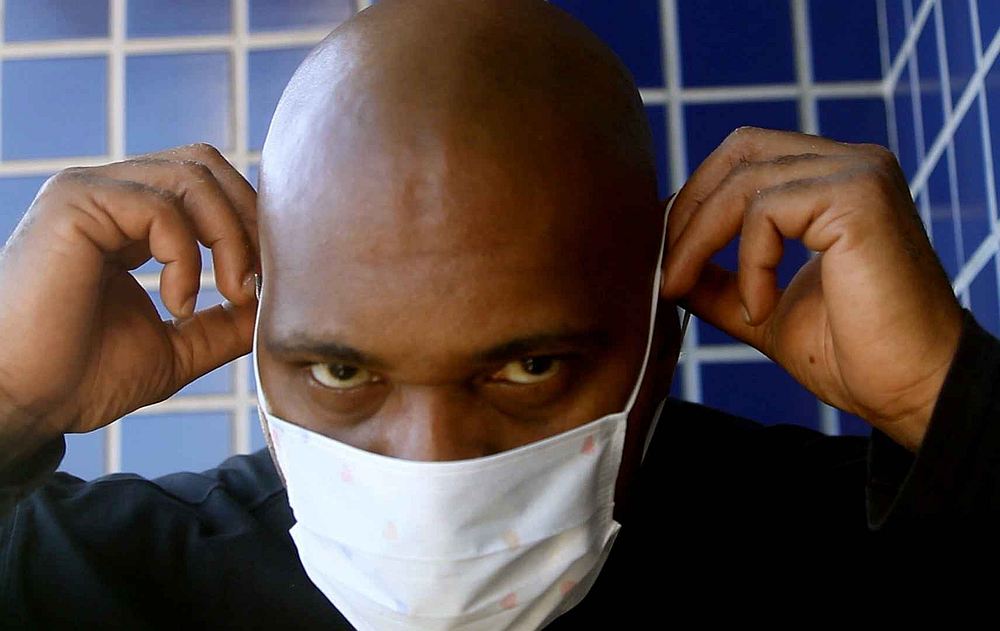 Brazilian rapper MV Bill poses as he wears a protective face mask during the Covid-19 outbreak, in Rio de Janeiro, Brazil March 26, 2020. u00e2u20acu201d Cufa handout via Reuters