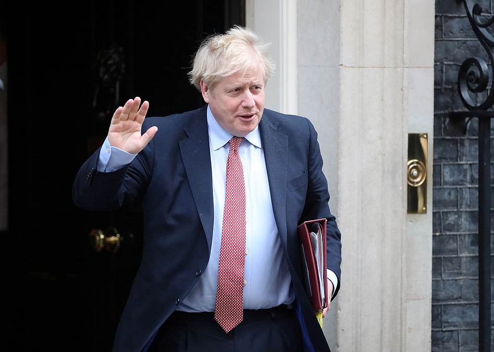 Britain's Prime Minister Boris Johnson waves as he leaves Downing Street, London, Britain March 25, 2020. u00e2u20acu201d Reuters pic