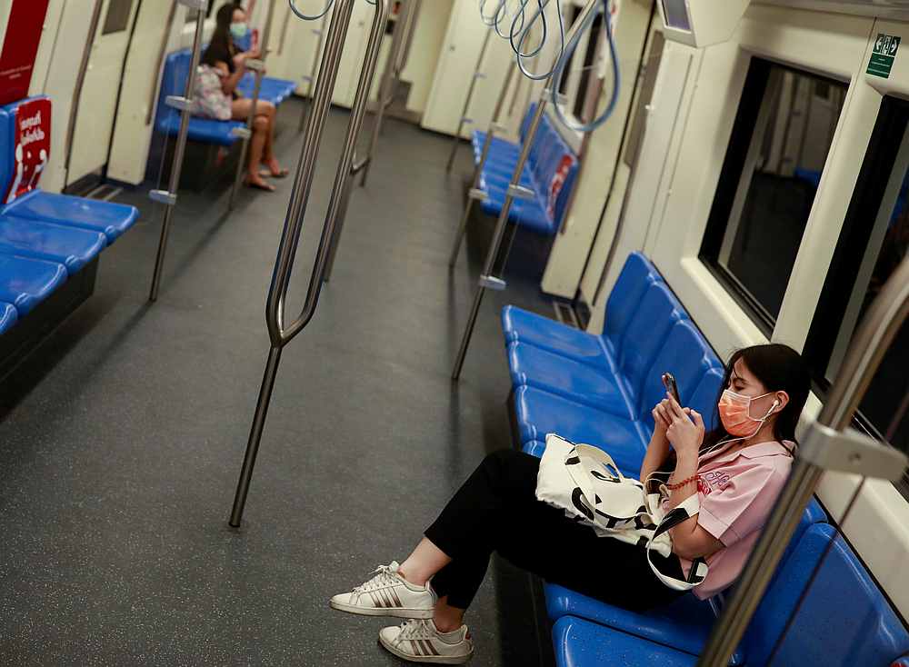 Passengers wear face masks due to the coronavirus disease (Covid-19) outbreak, in a train at Bangkok, Thailand March 20, 2020. u00e2u20acu201d Reuters pic