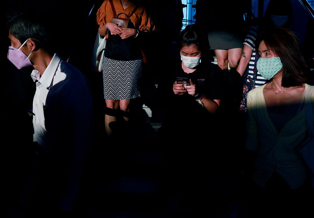 Passengers wear protective masks due to the Covid-19 outbreak, at a train station in Bangkok, Thailand March 23, 2020.  u00e2u20acu201d Reuters pic
