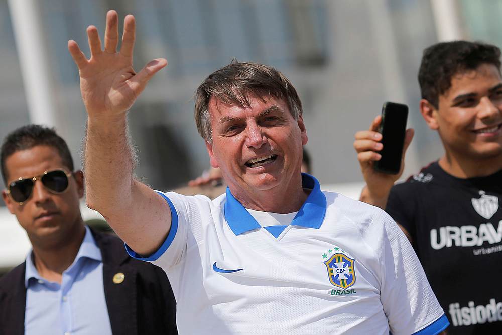 Brazil's President Jair Bolsonaro waves to supporters during a protest against Brazil's Congress and Brazilian Supreme Court in front the Planalto Palace in Brasilia March 15, 2020. u00e2u20acu201d Reuters pic