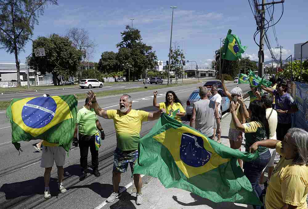 Demonstrators attend a protest against Rio de Janeiro Governor Wilson Witzel's measures on the Covid-19 outbreak and in support of Brazil's President Jair Bolsonaro, in Rio de Janeiro, Brazil, March 28, 2020. u00e2u20acu201d Reuters pi