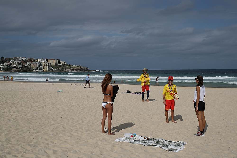 Surf rescue personnel enforce a closure of Bondi Beach to prevent the spread of Covid-19 in Sydney, Australia March 21, 2020. u00e2u20acu201d Reuters pic