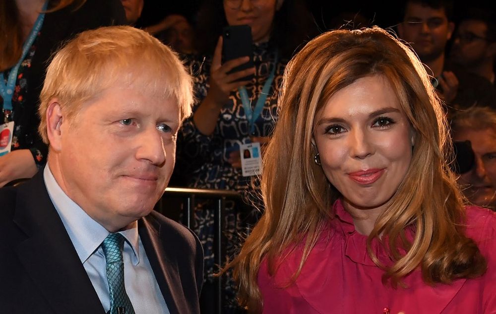 In this file photo taken on October 02, 2019 Britainu00e2u20acu2122s Prime Minister Boris Johnson leaves with his partner Carrie Symonds after delivering his keynote speech on the final day of the annual Conservative Party conference in Manchester. u00e2u20acu201d AFP pic