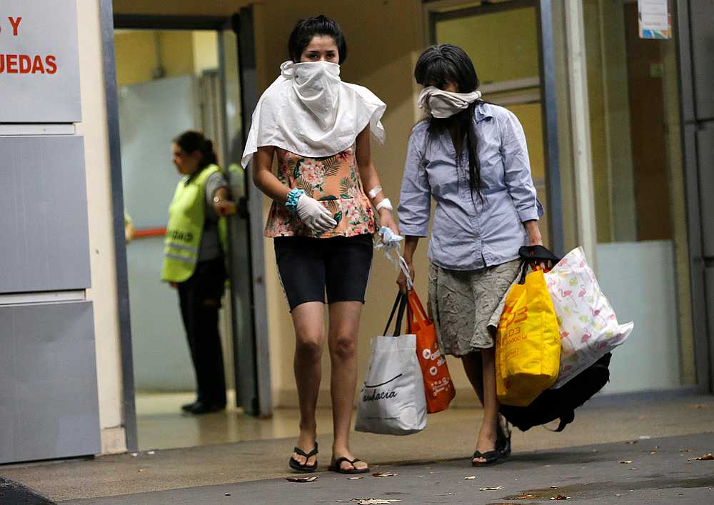 People cover their faces while leaving Hospital Cosme Argerich, after the first fatality from coronavirus in Latin America was confirmed, in Buenos Aires, Argentina March 7, 2020. u00e2u20acu201d Reuters pic
