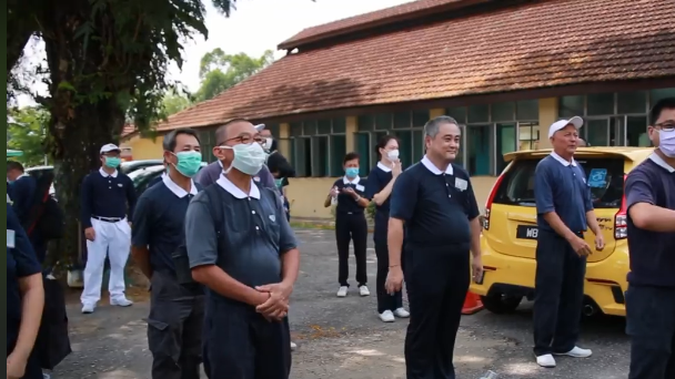 Volunteers must follow strict guidelines in cleaning and preparing the additional wards. — Screen capture via Facebook/ Tzu Chi Foundation Malaysia