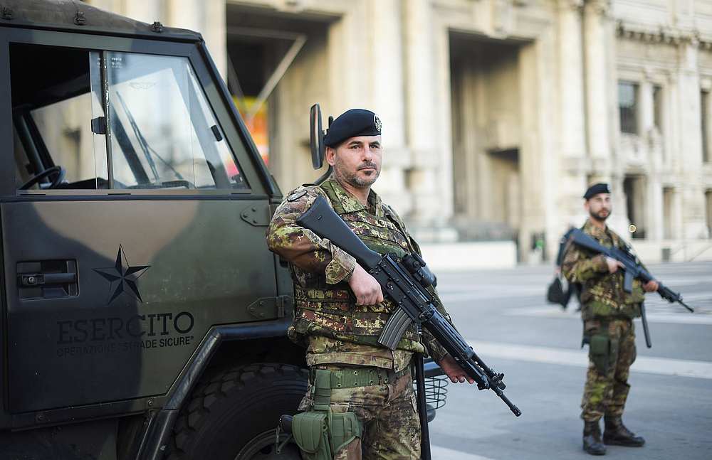Italian army soldiers patrol streets after being deployed to the region of Lombardy in Milan, Italy March 21, 2020. u00e2u20acu201d Reuters pic